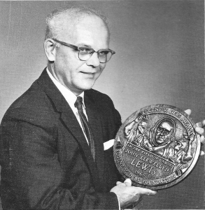 John Laska, designer of the Debs Award plaque with the first version of the plaque, given to John Lewis